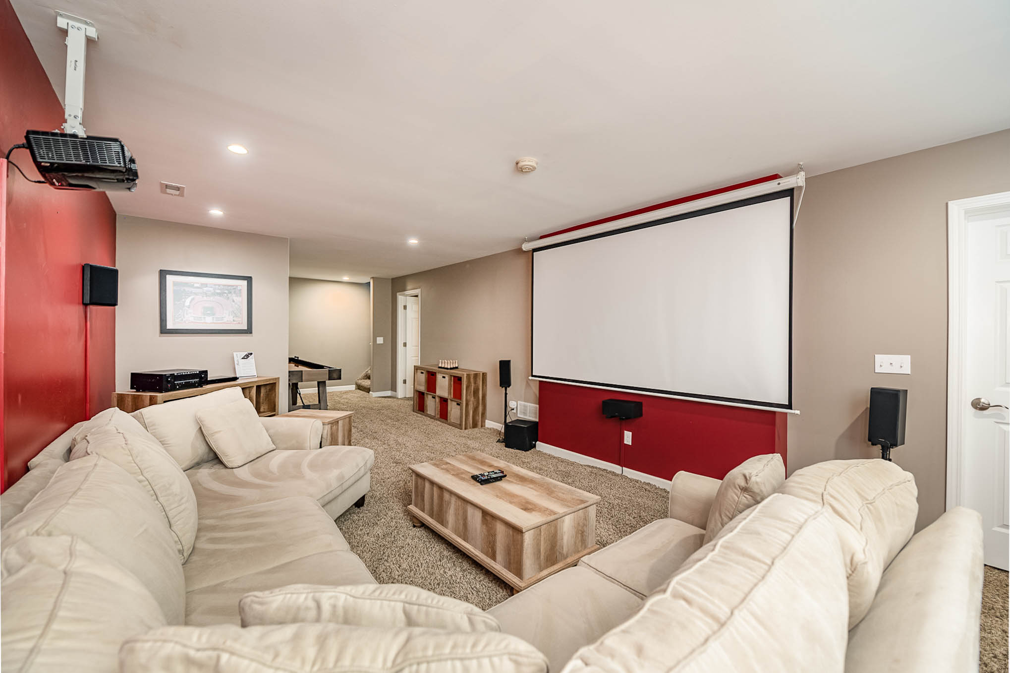 Downstairs with theater and shuffleboard